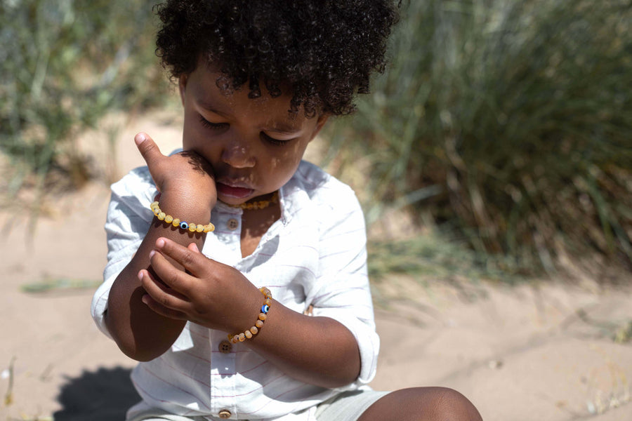 RAW HONEY BALTIC AMBER TEETHING BRACELET / ANKLET WITH EVIL EYE BEAD