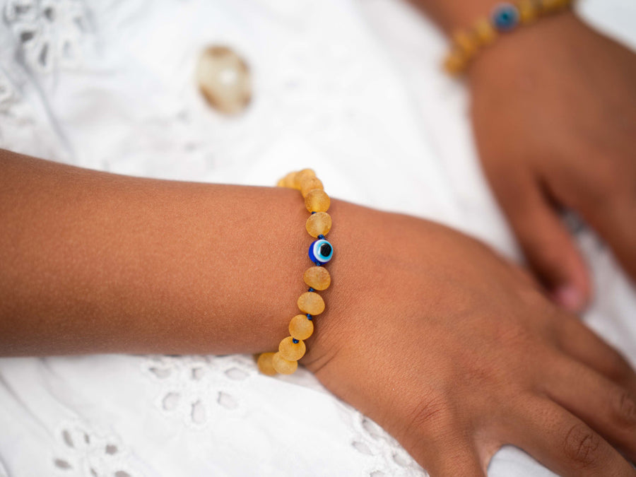 RAW HONEY BALTIC AMBER TEETHING BRACELET / ANKLET WITH EVIL EYE BEAD