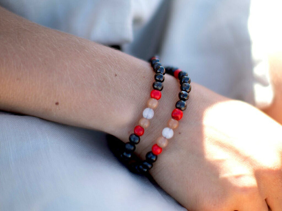 STRETCH POLISHED DARK CHERRY BALTIC AMBER ADULT BRACELET WITH SUNSTONE & MOONSTONE